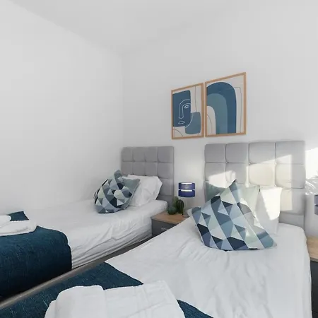 West Serviced Apartments: 2-bed, 2-bath With Parking Near Station