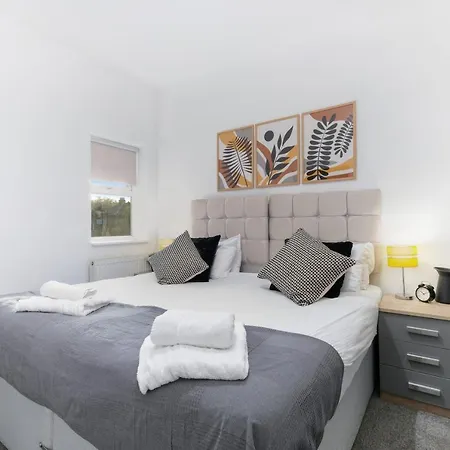 West Serviced Apartments: 2-bed, 2-bath With Parking Near Station