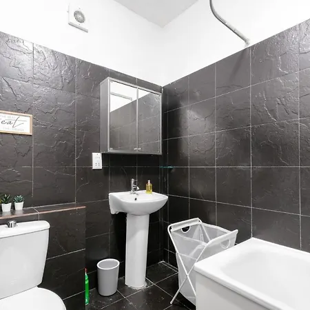 West Serviced Apartments: 2-bed, 2-bath With Parking Near Station *