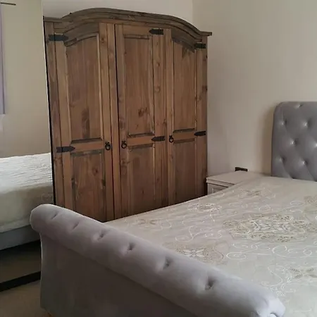 Primary Bedroom With King Size Bed In 3 London