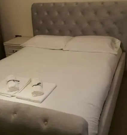 Primary Bedroom With King Size Bed In 3 Apartment London