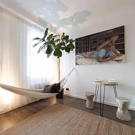 Apartment Tranquil Oasis W 100inch Cinema & Hammock, By The Design Traveller