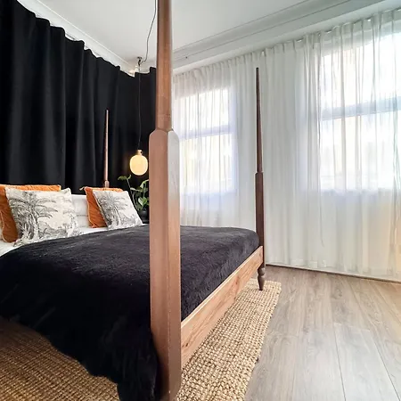 Apartment Tranquil Oasis W 100inch Cinema & Hammock, By The Design Traveller London
