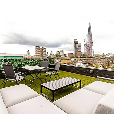 Modern Haven With Terrace View & Urban Charm *