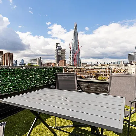 Modern Haven With Terrace View & Urban Charm Apartment