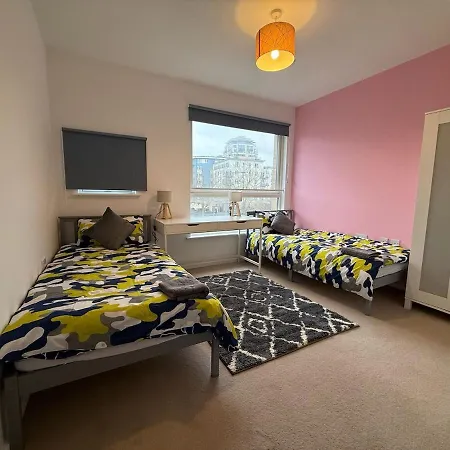 Balcony Breeze Modern 2-bedroom Apartment