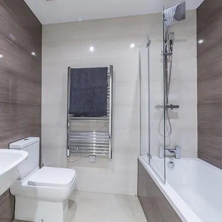 Гостевой дом Canning Town Stratford Apartments Лондон