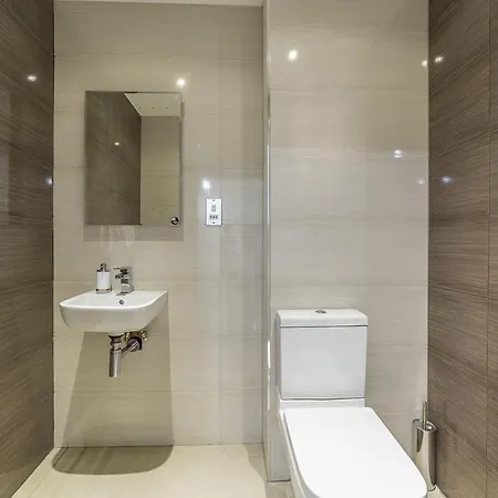 Гостевой дом Canning Town Stratford Apartments Лондон